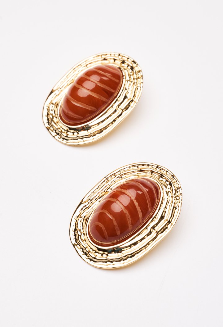 Earrings with textured surface and resin stone