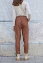 Jogger pants with leather effect