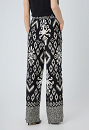 Straight patterned trousers.