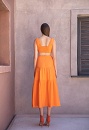 Midi dress with openings and a loop