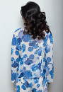 Blouse with floral pattern and ruffles