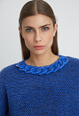 Sweater with decorative necklace